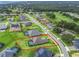 Aerial view of house and surrounding area at 5159 Greens Dr, Lady Lake, FL 32159