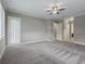 Bright and airy bedroom with sliding glass doors leading outdoors at 5159 Greens Dr, Lady Lake, FL 32159