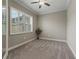 Bright bedroom with neutral walls and carpet flooring at 5159 Greens Dr, Lady Lake, FL 32159
