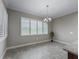 Spacious breakfast nook with large windows and neutral color palette at 5159 Greens Dr, Lady Lake, FL 32159