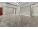 Spacious living room with tile floors and access to other rooms at 5159 Greens Dr, Lady Lake, FL 32159
