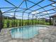 Inviting screened pool with spacious patio at 5159 Greens Dr, Lady Lake, FL 32159
