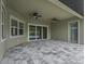 Covered patio with sliding doors and tile flooring at 5159 Greens Dr, Lady Lake, FL 32159