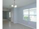 Bright dining area with light walls and tile floors at 3654 Caspian St, Leesburg, FL 34748