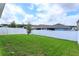Large grassy backyard with privacy fence at 3654 Caspian St, Leesburg, FL 34748