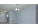 Bright dining area with light walls and a ceiling fixture at 3654 Caspian St, Leesburg, FL 34748