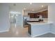 Modern kitchen with stainless steel appliances and an island at 3654 Caspian St, Leesburg, FL 34748