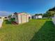 Exterior view of a storage shed in the backyard at 1660 Elkhart Cir, Tavares, FL 32778