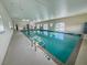 Indoor swimming pool with clean lines and a relaxing atmosphere at 1660 Elkhart Cir, Tavares, FL 32778