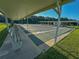Enjoy a relaxing game of shuffleboard under the covered area at 1660 Elkhart Cir, Tavares, FL 32778