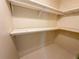 Shelving and hanging rod in this spacious closet at 1660 Elkhart Cir, Tavares, FL 32778
