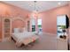 bedroom with a castle-themed bed and pink walls at 15617 Pendio Dr, Bella Collina, FL 34756