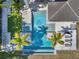 Overhead view of a luxurious pool and spa at 15617 Pendio Dr, Bella Collina, FL 34756
