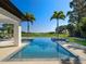 Large, inviting pool with spa and serene water views at 15617 Pendio Dr, Bella Collina, FL 34756