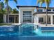 Luxury pool with spacious patio and stunning home view at 15617 Pendio Dr, Bella Collina, FL 34756