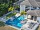Elegant pool and spa with spacious patio at 15617 Pendio Dr, Bella Collina, FL 34756