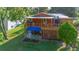 Elevated deck with awning, offering outdoor entertaining space at 151 S Clayton St, Mount Dora, FL 32757