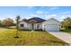 New construction home with craftsman style and landscaping at 577 Dowling Cir, Lady Lake, FL 32159