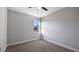 Bright bedroom with carpeted floors and a window at 577 Dowling Cir, Lady Lake, FL 32159