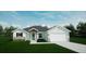 New construction home with modern design and landscaping at 577 Dowling Cir, Lady Lake, FL 32159