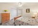 Cozy guest bedroom with a double bed and ample closet space at 5206 Fantasy Way, Leesburg, FL 34748