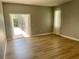 Bedroom with access to a screened patio at 39331 Treeline Dr, Lady Lake, FL 32159