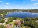 Aerial view of house near the lake at 687 W Lakeshore Dr, Clermont, FL 34711