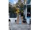 Relaxing backyard oasis with a hot tub and walkway at 101 S Dixie Ave, Fruitland Park, FL 34731