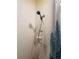 Clean shower with tiled walls and a shower curtain at 101 S Dixie Ave, Fruitland Park, FL 34731