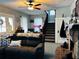 Spacious living room featuring a fireplace and hardwood floors at 101 S Dixie Ave, Fruitland Park, FL 34731