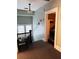 Upper hallway with carpet, a small table and bedroom access at 101 S Dixie Ave, Fruitland Park, FL 34731