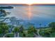 Scenic aerial view of a lakefront park at sunset at 1240 Tangerine Ct, Eustis, FL 32726