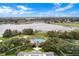 Resort-style pool and surrounding landscape; perfect for relaxing and recreation at 5500 Belle Terre Dr, Leesburg, FL 34748