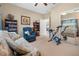 Relaxing office space with exercise equipment and built-in shelving at 5500 Belle Terre Dr, Leesburg, FL 34748