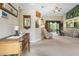 Spacious living room with comfortable seating and a view to the backyard at 5500 Belle Terre Dr, Leesburg, FL 34748