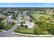 Aerial view of house and neighborhood at 5500 Belle Terre Dr, Leesburg, FL 34748