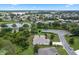 Aerial view showing home location and landscape; ideal for buyers seeking community context at 5500 Belle Terre Dr, Leesburg, FL 34748