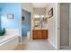 Bright bathroom with dual vanity, shower, and ample storage at 5500 Belle Terre Dr, Leesburg, FL 34748