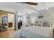 Bright bedroom with a queen bed, and en-suite bathroom at 151 S Clayton St, Mount Dora, FL 32757