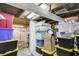 Unfinished basement with storage space and various containers at 151 S Clayton St, Mount Dora, FL 32757