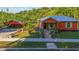 Cute cottage style home with a large front yard at 151 S Clayton St, Mount Dora, FL 32757