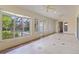 Bright sunroom with tile floors and access to backyard at 2079 Clarks Hill Way, The Villages, FL 32162