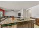 Modern kitchen with granite countertops and stainless steel appliances at 3450 Landing Vw, Tavares, FL 32778