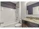 Bathroom with tub shower combo and granite vanity at 3450 Landing Vw, Tavares, FL 32778
