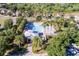 Community pool with cabana and surrounding landscaping at 3450 Landing Vw, Tavares, FL 32778