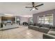 Open concept living room with kitchen and dining area views at 3450 Landing Vw, Tavares, FL 32778