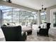 Spacious screened lanai overlooking the backyard, perfect for entertaining at 3457 Lake Diane Rd, Tavares, FL 32778