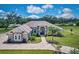Luxury home with expansive grounds and stunning architectural features at 3457 Lake Diane Rd, Tavares, FL 32778