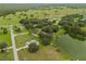 Aerial view of property showcasing house and surrounding area at 23555 Milford Dr, Eustis, FL 32736