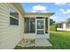 House exterior showcasing a screened-in porch at 3325 Reston Dr, The Villages, FL 32162